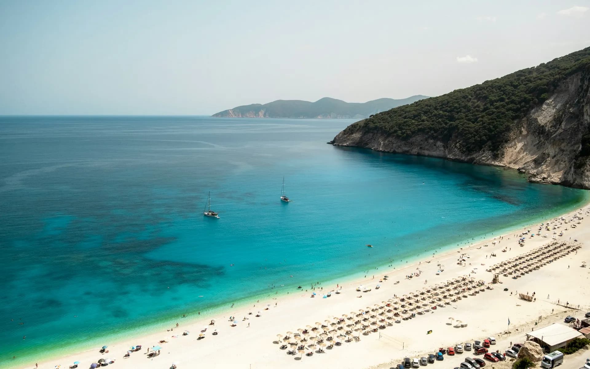 Myrtos Beach with its turquoise waters and dramatic limestone cliffs on Kefalonia, Greece